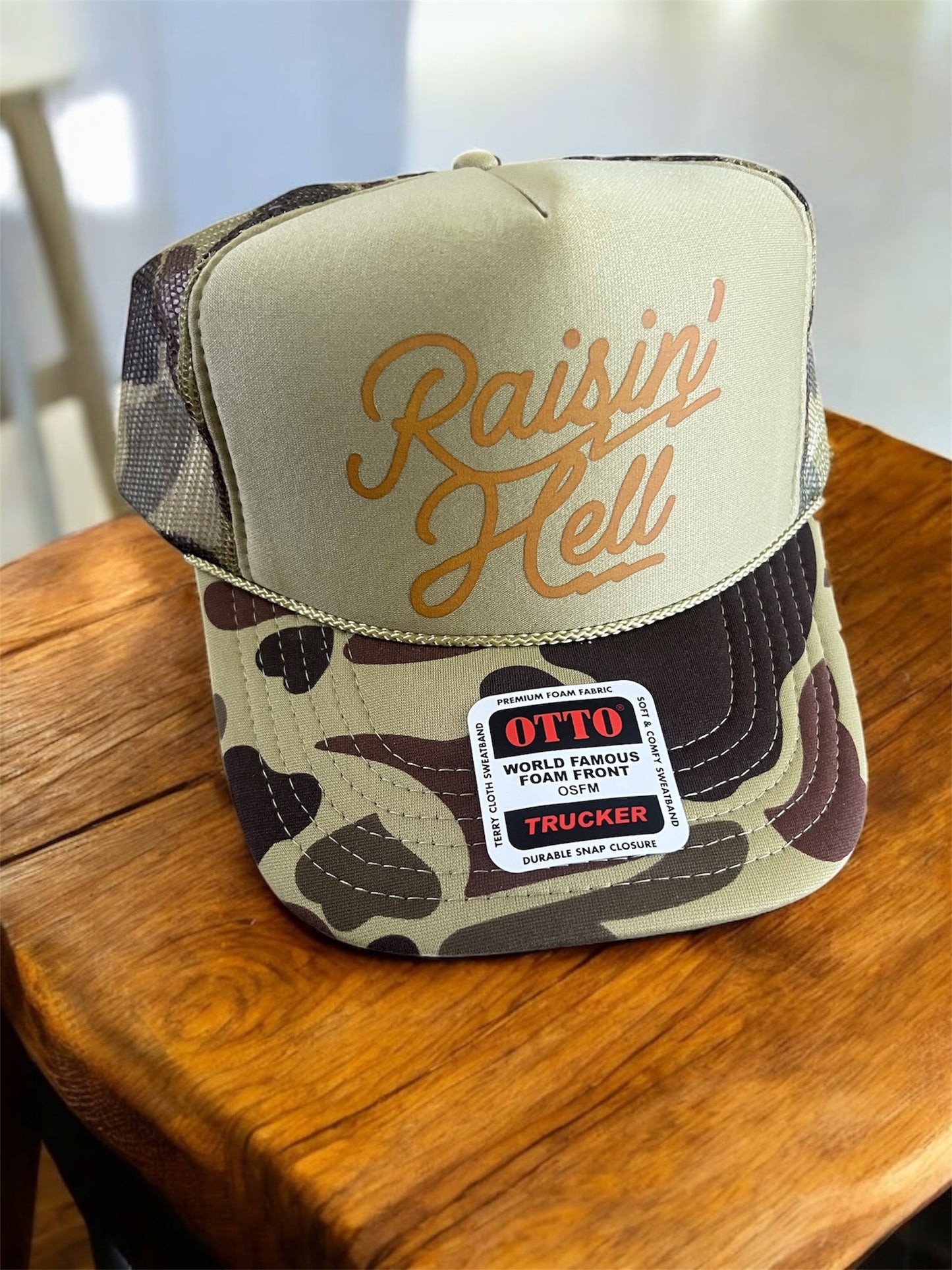 Raisin’ Hell Trucker Hat