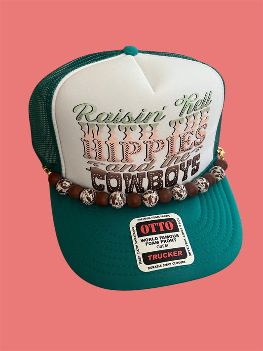 Raisin’ Hell With The Hippies And The Cowboys Trucker Hat